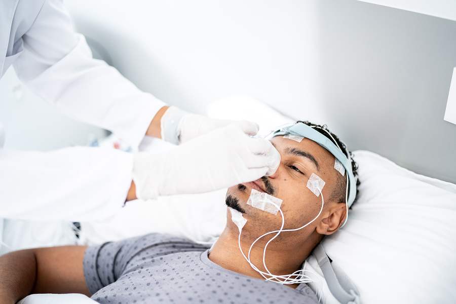 Medical professional conducting sleep test