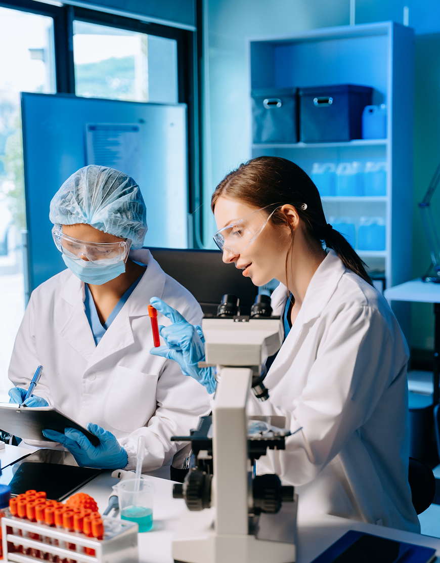 Researchers analyzing samples in lab