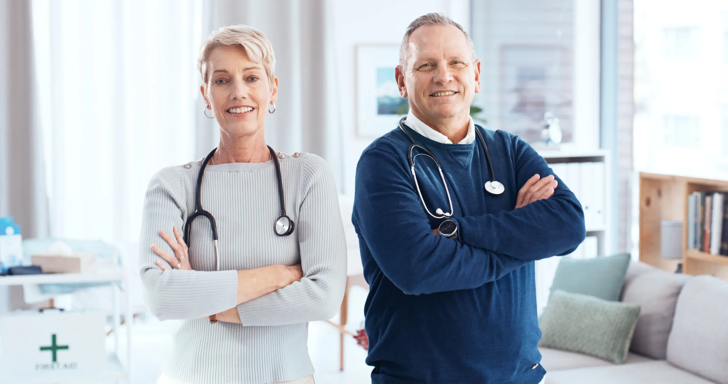 Confident Senior Doctors Standing Together in a Modern Medical Office