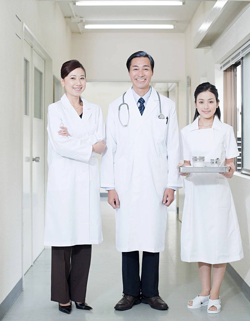Doctors and nurse in white coats
